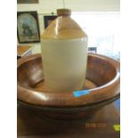 A Victorian wooden wash bowl with metal strap work, together with a pottery flagon