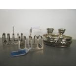 A pair of Collingwood four section silver toast racks, a pair of silver dwarf candlesticks and a