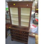 A small reproduction mahogany chest of drawers, together with an Edwardian glazed two door cabinet