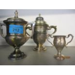 Two silver trophies with lids and a small silver trophy, total weight 413.2g