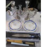 A mixed lot to include three decanters, one having a silver collar, a glass bowl with a silver