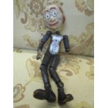 A SABA Bucherer articulated male doll in joined metal and composition doll A/F 8 1/4"h