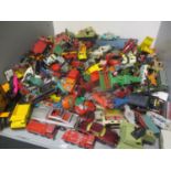 A large quantity of mixed lot of play worn diecast vehicles Lesney Matchbox etc. to include Corgi
