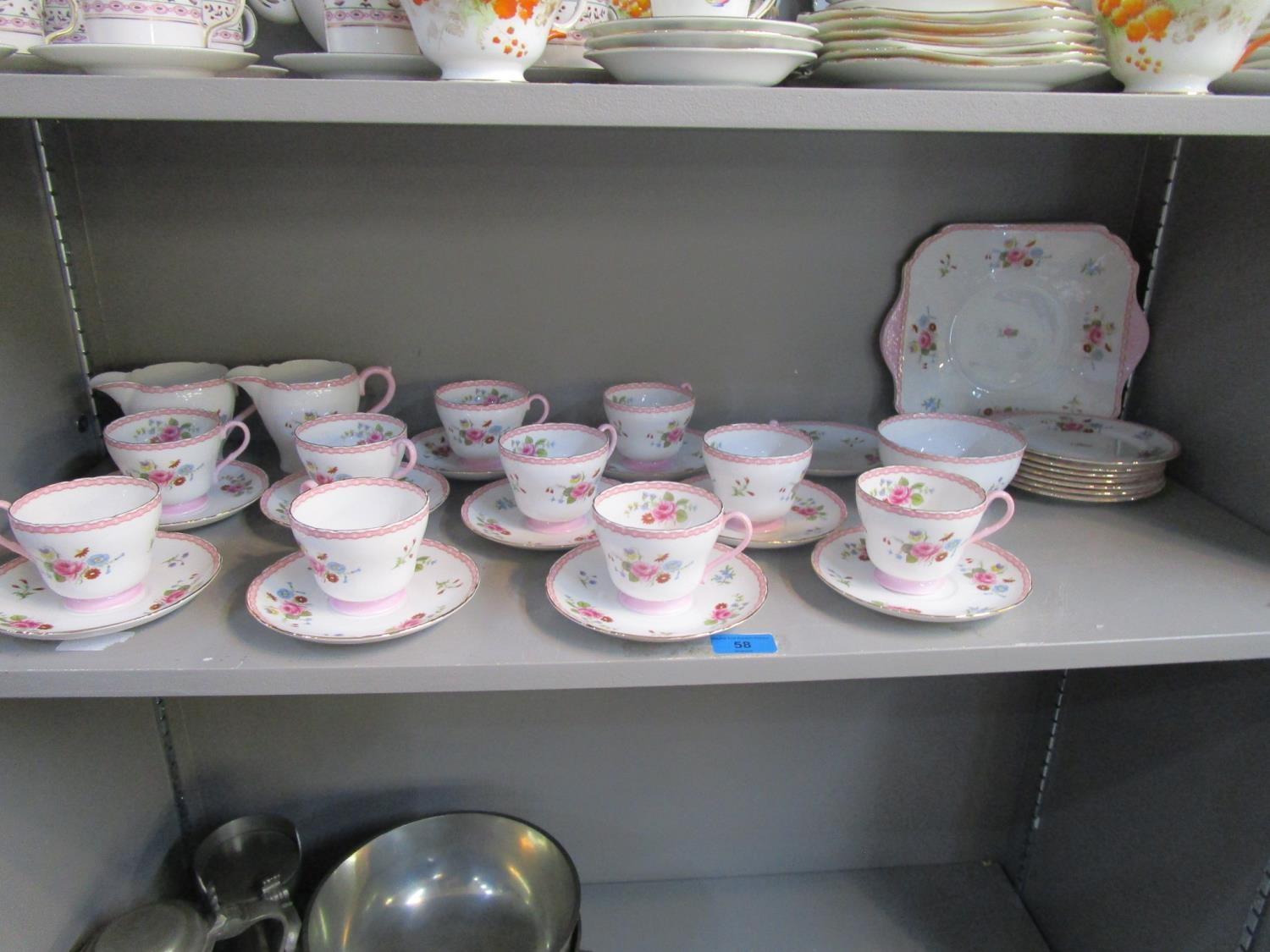 A Shelley part teaset decorated with flower sprays