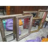 Six different modern wall hanging mirrors to include one having an ornate gilt coloured frame with