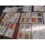 A mixed lot to include Royal Mail albums of approximately 730 postcards, an album of hundreds of