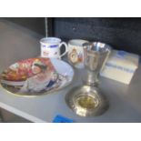 A mixed lot of commemorative items to include a silver pin dish, together with a silver plated