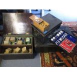 A strong box, together with a twin handled metal box, a treen box containing vintage powder paints