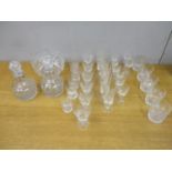 Glassware to include two silver rimmed decanters, a fruit bowl, six champagne flute tumblers,