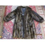 A Canadian wolf 3/4 length coat supplied for Harrods in the late 1970's/early 1980's,