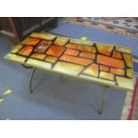A mid 20th century retro Denmor of London glass and metal framed coffee table with magazine shelf