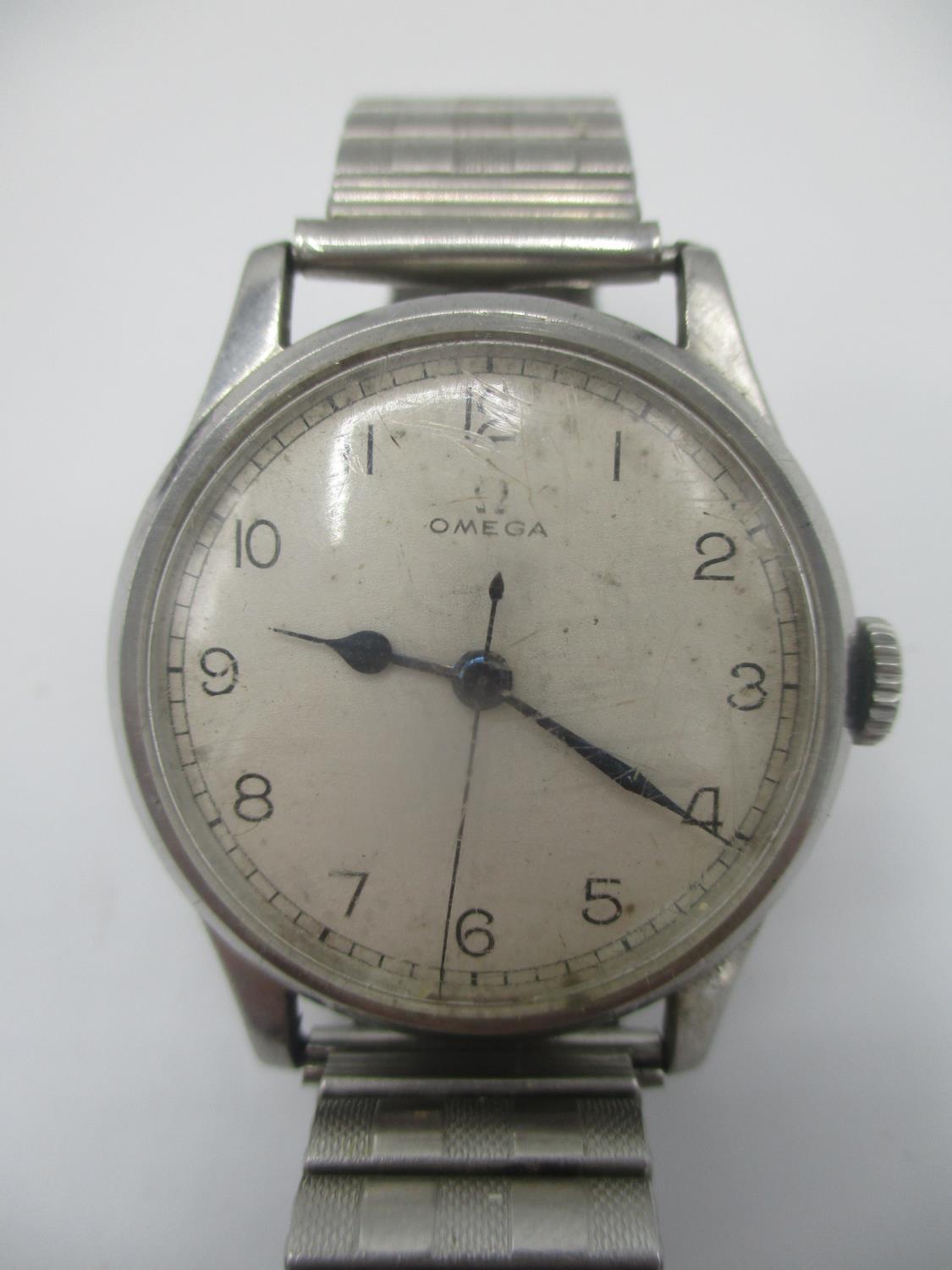 A WW2 Omega manual wind gents stainless steel wristwatch, circa 1943, possibly military. The dial