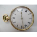 An early 20th century 12ct gold keyless wound fob watch, having a white enamel dial with Roman