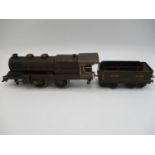 Hornby 0 gauge locomotive clockwork 31801 with tender 31801 nord rear locomotive wheels missing