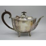 An early 20th century silver teapot by Fenton Brothers Ltd, Sheffield 1929, of waisted, shaped form,