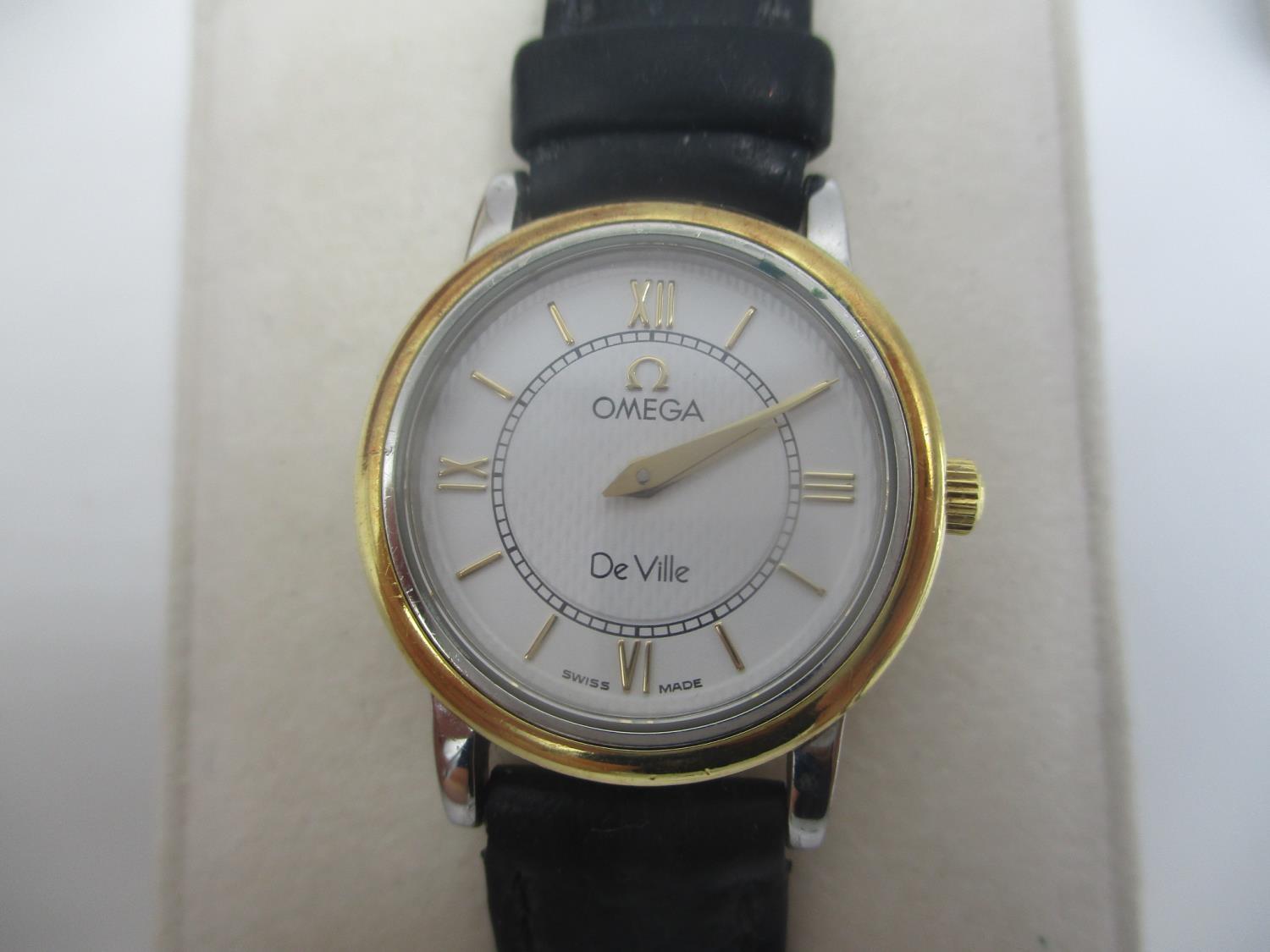 A modern Omega De Ville ladies, steel and gold quartz wristwatch having a white dial with gilt Roman