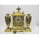 A 19th century French, gilt metal mantle clock and garniture set. The clock in the form of a Chinese
