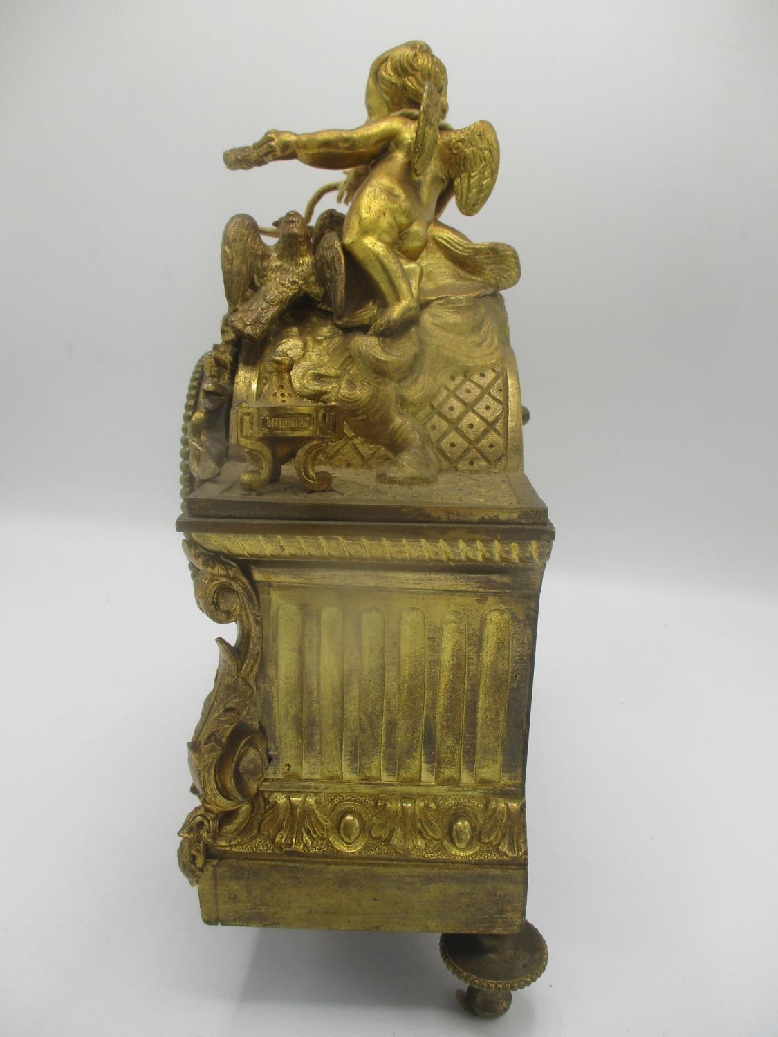 A mid/late 19th century French gilt metal mantle clock decorated with a cherub to the top with two - Image 4 of 7