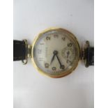 An early 20th century Rolex manual wind 9ct gold ladies wristwatch, having Arabic numerals with