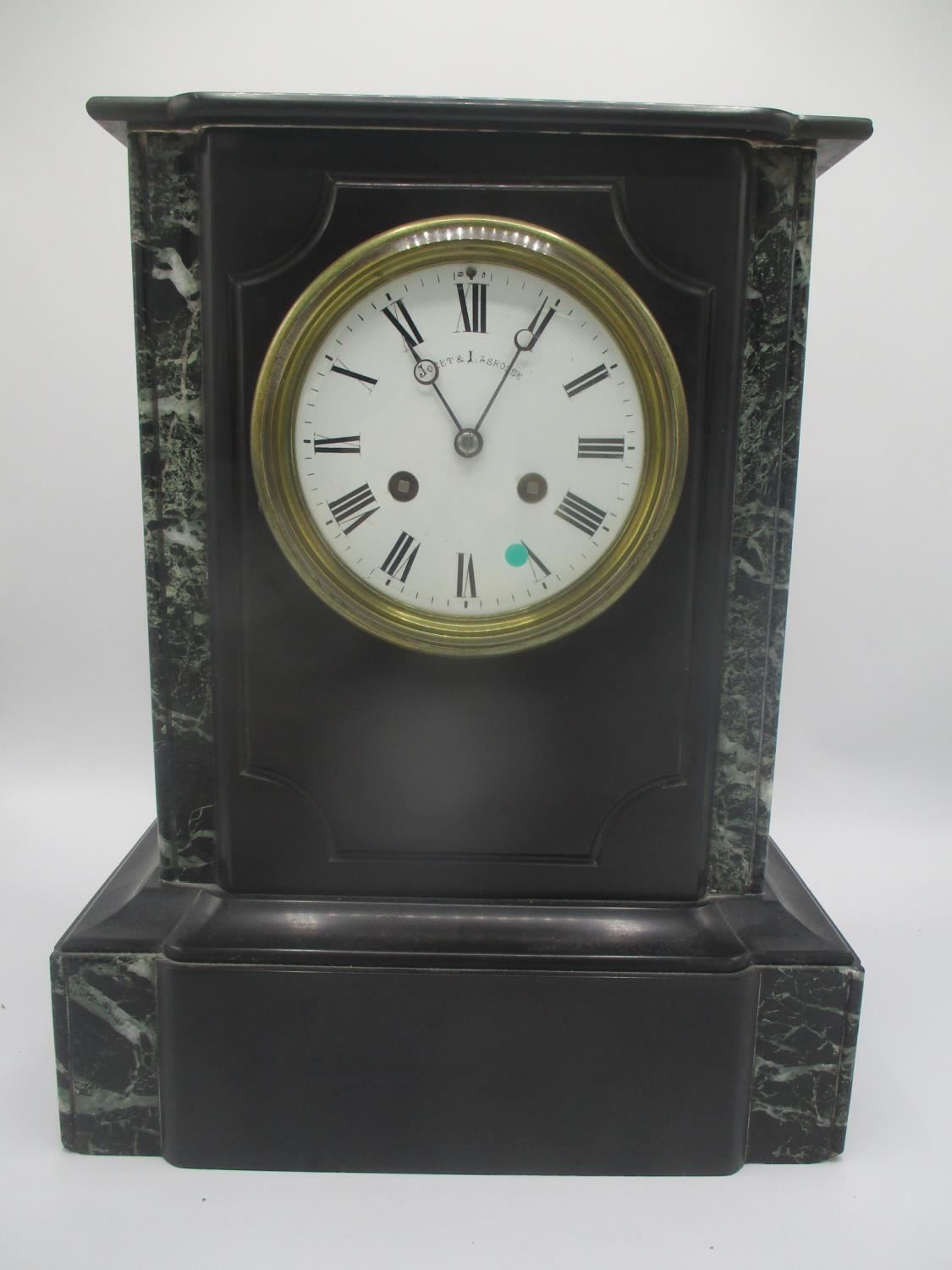 A late 19th century large slate and marble mantle clock, having a white enamel dial, signed