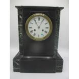 A late 19th century large slate and marble mantle clock, having a white enamel dial, signed