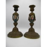 A pair of late 19th century French gilt metal and porcelain candlesticks with detachable sconces,