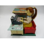 A Linemar Toys (made in Japan) tin plate, battery operated Busy Secretary with light moving