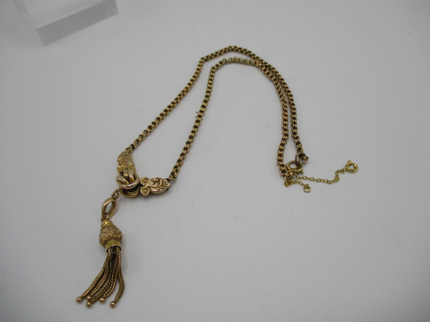 A Victorian 9ct gold necklace with a double link, a knot flanking by twin engraved floral panels and - Image 3 of 4