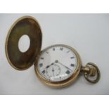 An early 20th century half hunter gold plated, keyless wind pocket watch having a white enamel