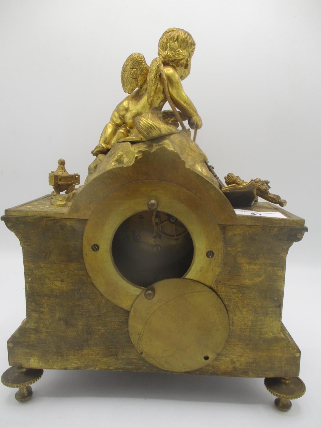 A mid/late 19th century French gilt metal mantle clock decorated with a cherub to the top with two - Image 5 of 7