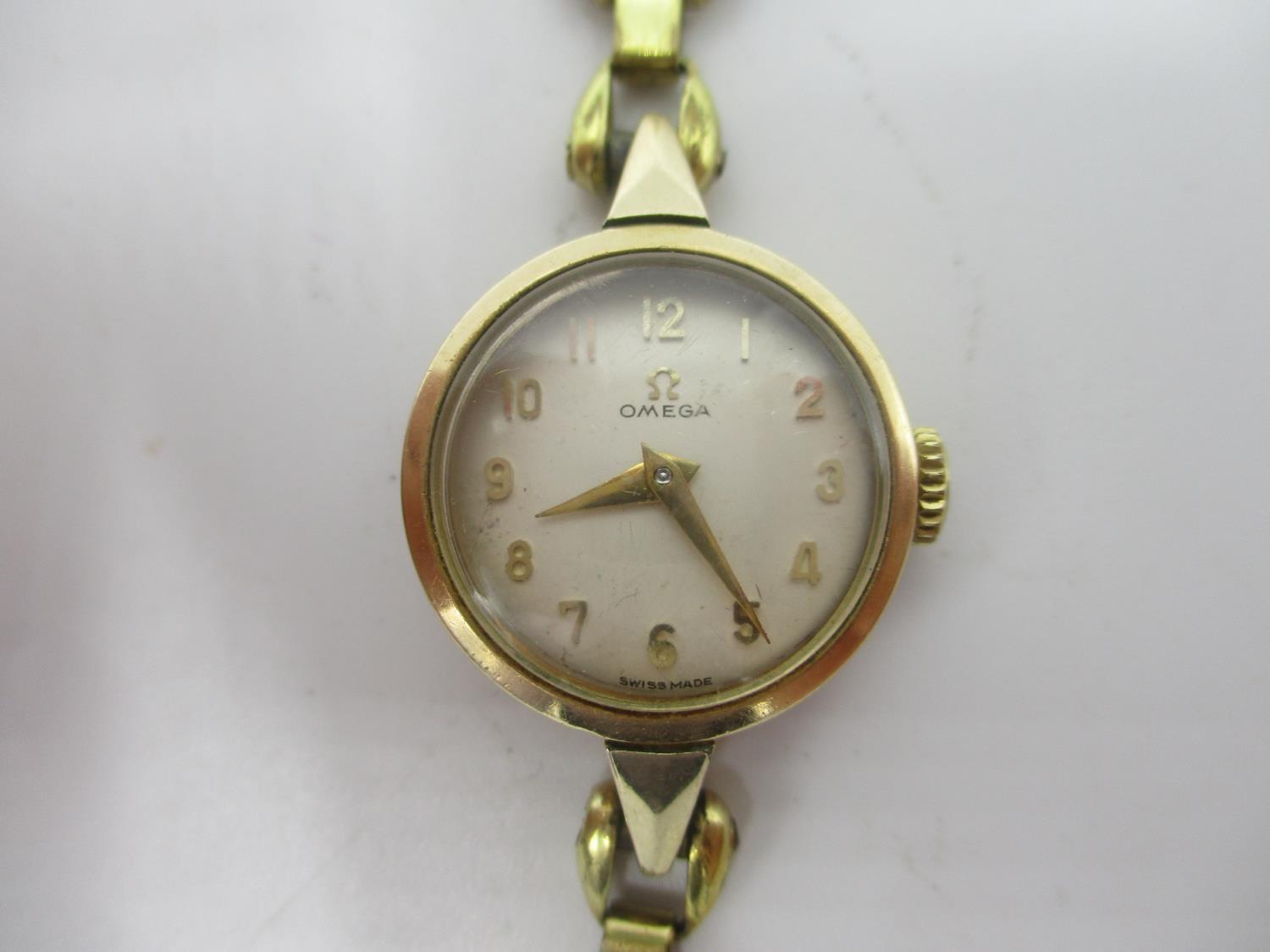 An Omega manual wind, gold plated ladies wristwatch, circa 1956 having a white dial with Arabic