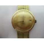 A Bucherer automatic 18ct gold gents wristwatch circa 1960, having a gilt dial with centre seconds