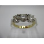 An 18ct gold three stone diamond ring approximately 1.50ct, total size L/M, 4.2g