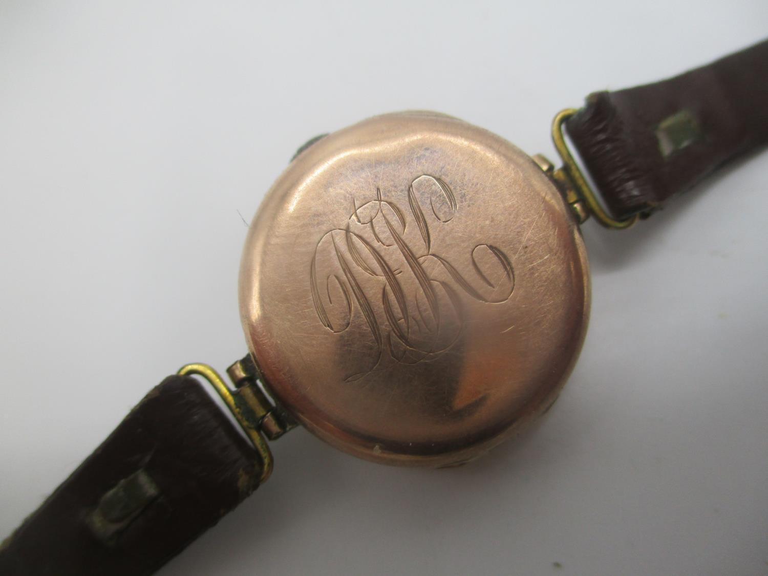 An early 20th century Rolex manual wind 9ct gold ladies wristwatch having a gilt dial, the case back - Image 4 of 5