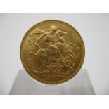 An Edwardian gold full sovereign with St George to the obverse 1905