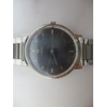 An Omega manual wind gents, stainless steel 1960s wristwatch having a blue dial with centre seconds,