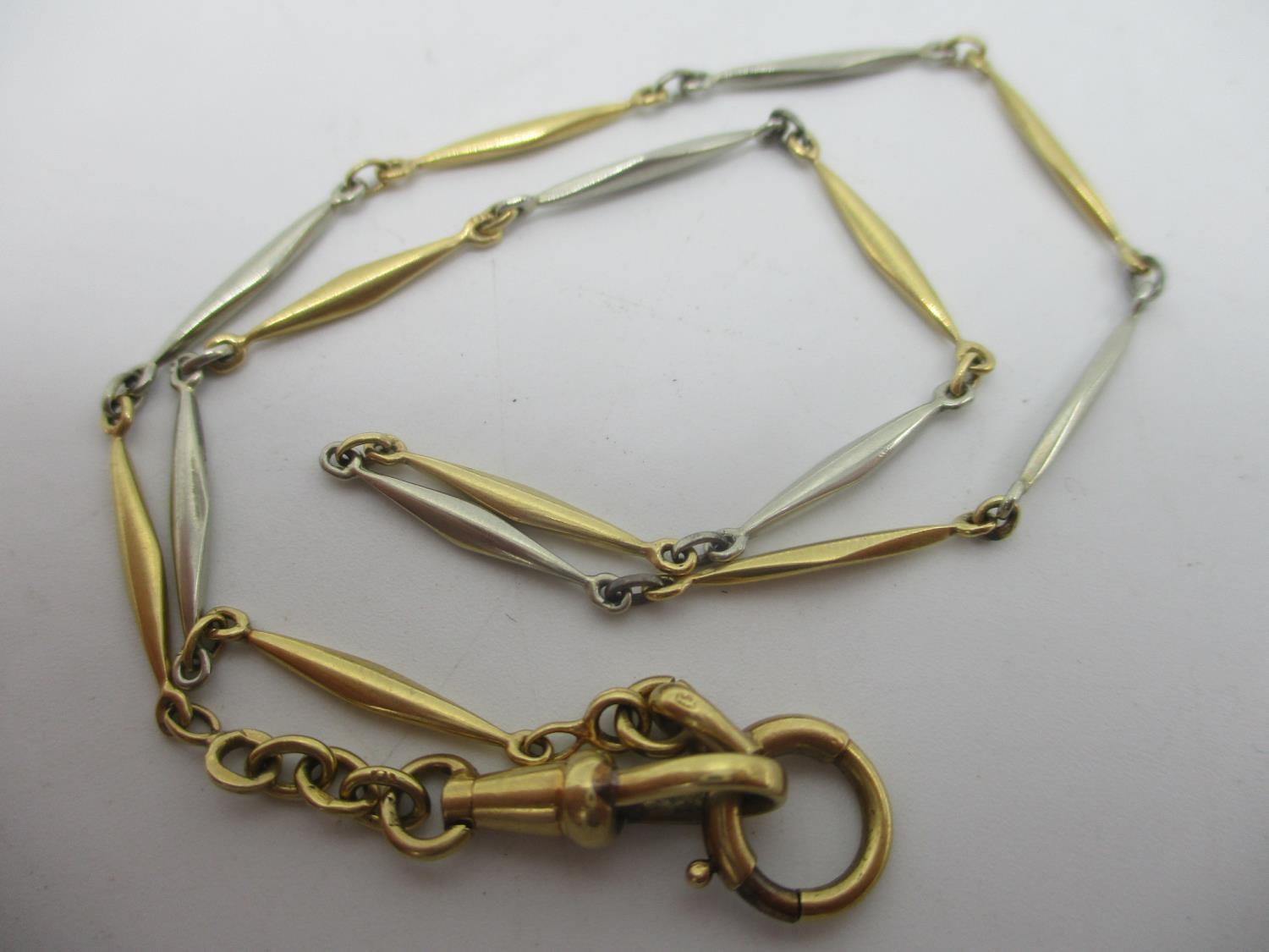 An early 20th century white and yellow metal pocket watch chain, total weight 9.5g