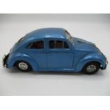 A 1950s/60s Bandai Japanese tin plate Volkswagen Beetle, blue body, Friction Drive, 3" h x 7 1/2"l