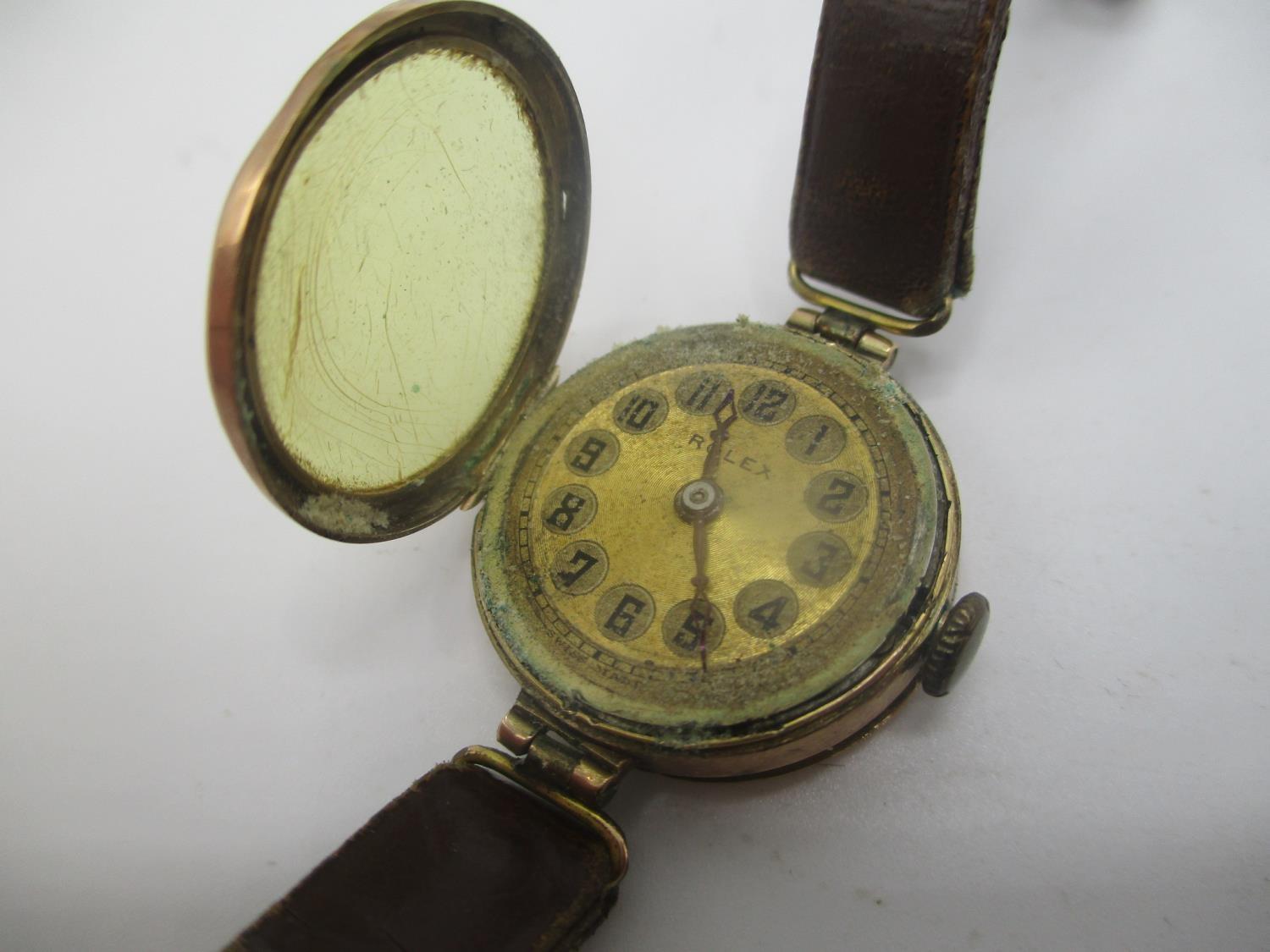 An early 20th century Rolex manual wind 9ct gold ladies wristwatch having a gilt dial, the case back