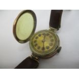 An early 20th century Rolex manual wind 9ct gold ladies wristwatch having a gilt dial, the case back