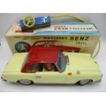 A 1960s Yangman Japanese Mercedes Benz 230SL remote control, tin plate car, battery operated, with