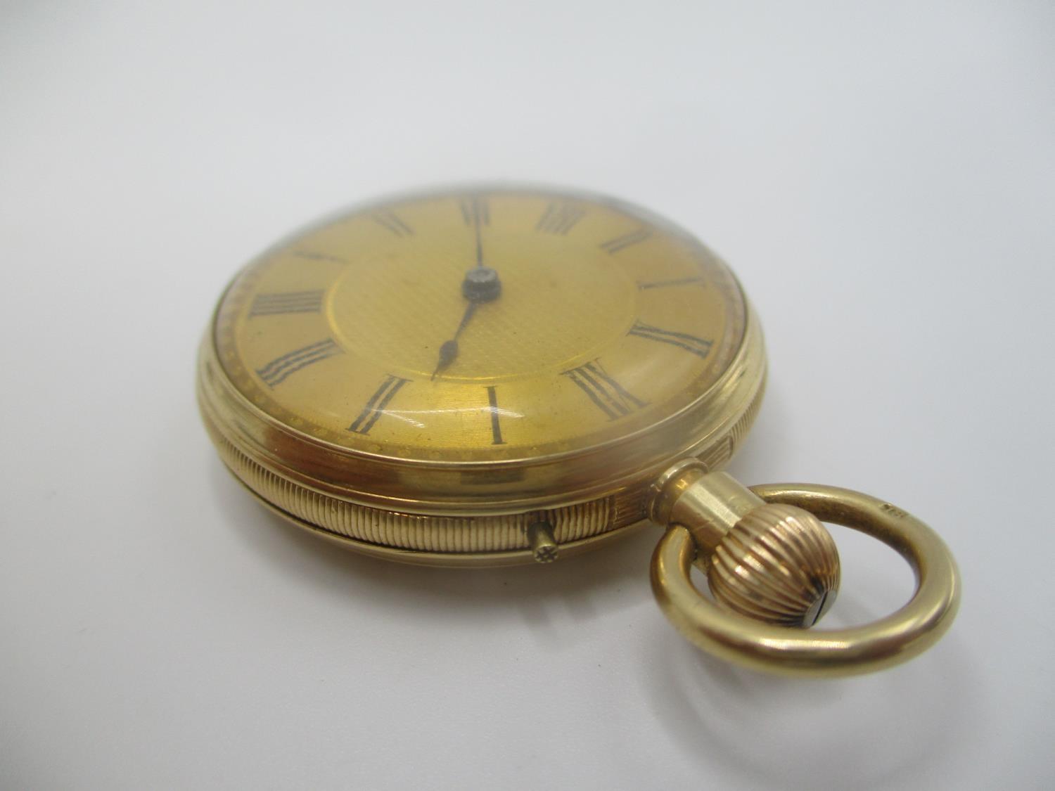 A late 19th/early 20th century 18ct gold open faced, keyless wound fob watch having a machine turned - Image 2 of 6