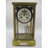 A late 19th century French Samuel Marti 8 day brass mantle clock. The case having engraved