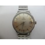 An Omega Seamaster automatic stainless steel gents wristwatch c. 1965, having a silvered dial with