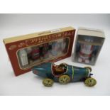 A Japanese boxed wind up Action Mr Atomic tin toy robot by Cragstan, limited edition, 4" h, along