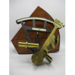 A 19th century hardwood and brass sexton with an ivory gauge, folding lenses and a rotating