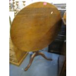 A Georgian mahogany pedestal tilt top occasional table, 28"high, the top 34 5/8"dia