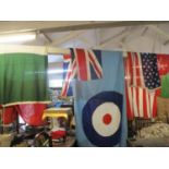 Four large fabric flags to include an RAF with Union Jack flag, an American flag and two others