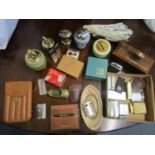 A mixed lot of vintage lighters to include a Ronson Newport, along with a 1930s walnut desk