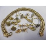 A selection of 9ct gold and yellow metal jewellery to include a bracelet, a sapphire and diamond